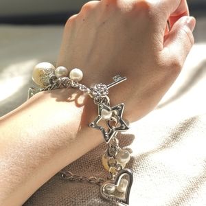 Hearts and Star Charmed Bracelet Cream Color